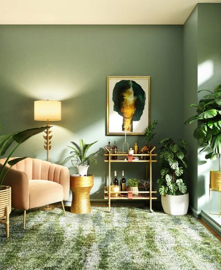 Living room in green shades with plants and natural light