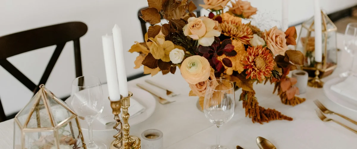 Fall interior design with cozy blankets, autumn decorations, and warm seasonal colors