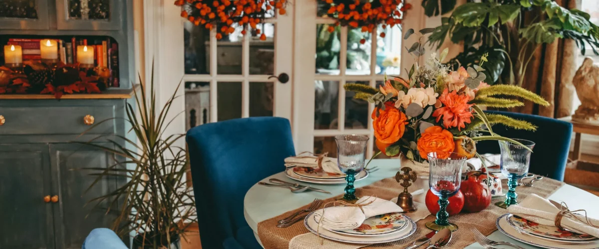 Warm autumn home decor ideas featuring earthy tones, cozy textiles, and natural fall decorations.