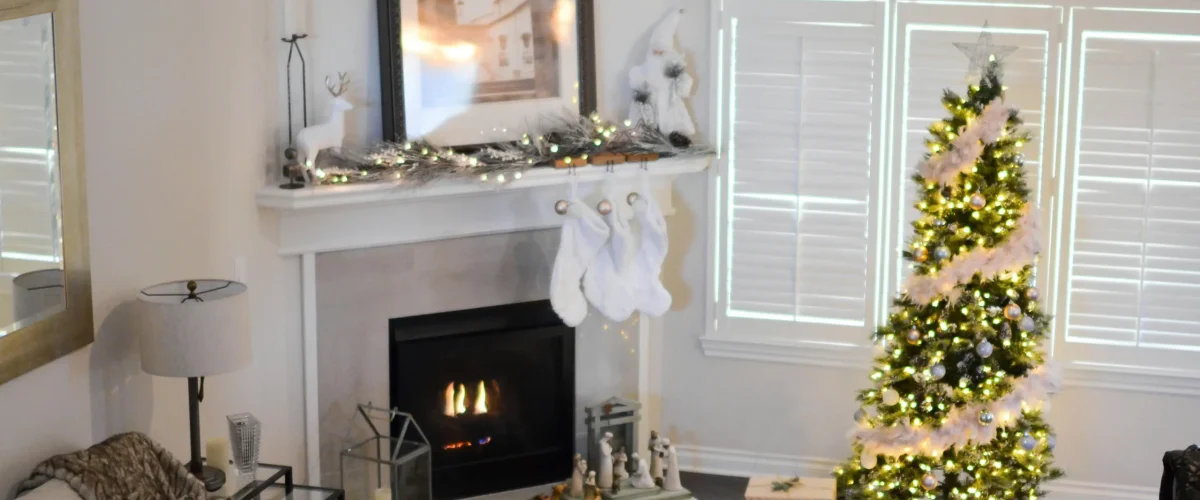 Modern home with Christmas decorations, tree, and cozy holiday details.