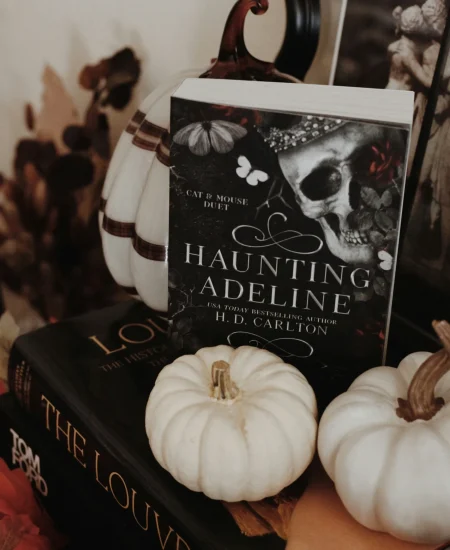 Gothic home accessories like candelabras, skulls, and dark floral arrangements