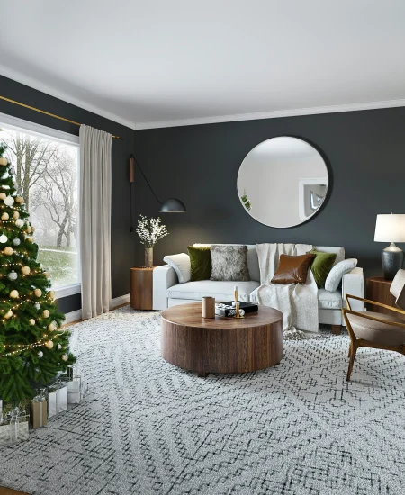 Cozy living room Christmas tree with warm lights and classic ornaments.