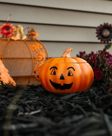 Hand-painted pumpkins in creative colors and designs for Halloween decor.