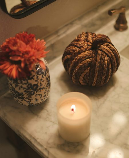 Handmade woven pumpkin decoration with cozy autumn aesthetic